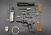 1:3 Beretta 92FS Handgun - Silver miniature model disassembled showing detailed die-cast metal parts and brown grips.