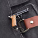 1:3 Beretta 92FS Handgun - Black miniature model with black slide and tan grips shown on fabric background.