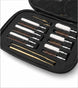 A 12-piece firearm cleaning kit with brass rods, white foam brushes, and copper wire brushes organized in a black zippered carrying case.