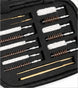 A 12-piece gun cleaning kit with brass rods, copper wire brushes, and white cleaning cloths, neatly arranged in a black zippered case.