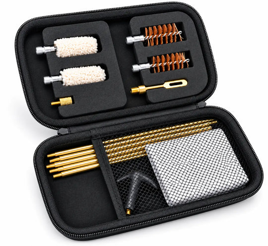 An open black zippered carrying case filled with cleaning tools, including brass rods, two white foam brushes, orange-and-silver wire brushes, a small metal tool, and a gray cloth, shown on a white background.