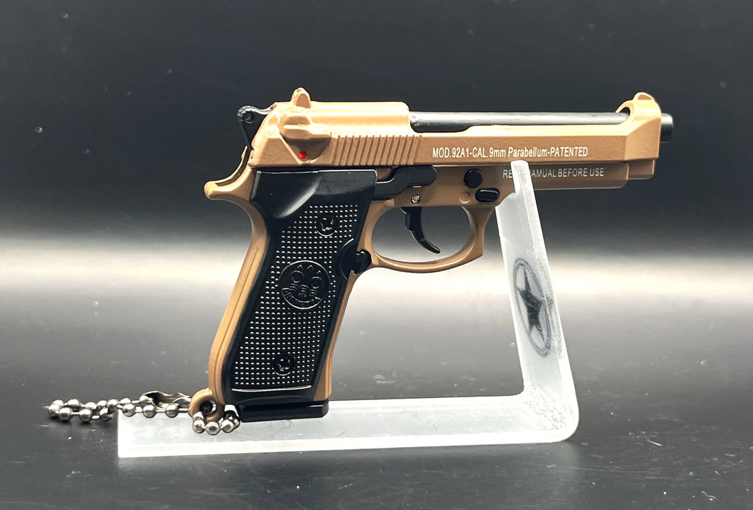 1:3 Beretta 92FS Handgun - Desert Tan miniature with die cast metal parts and working safety and slide actions.