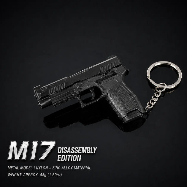 A black disassembled toy gun keychain on a black background, with text reading 'M17 DISASSEMBLY EDITION' and material details below.