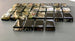 Bullets and Casings Dominos Double 6 Set handmade domino pieces with embedded bullet casings arranged on a flat surface.