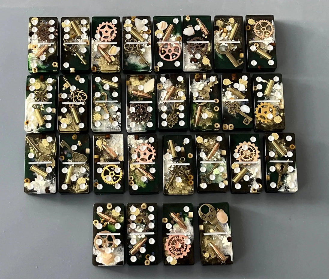 Bullets and Casings Dominos Double 6 Set with unique handmade pieces featuring bullets and gears on black tiles.