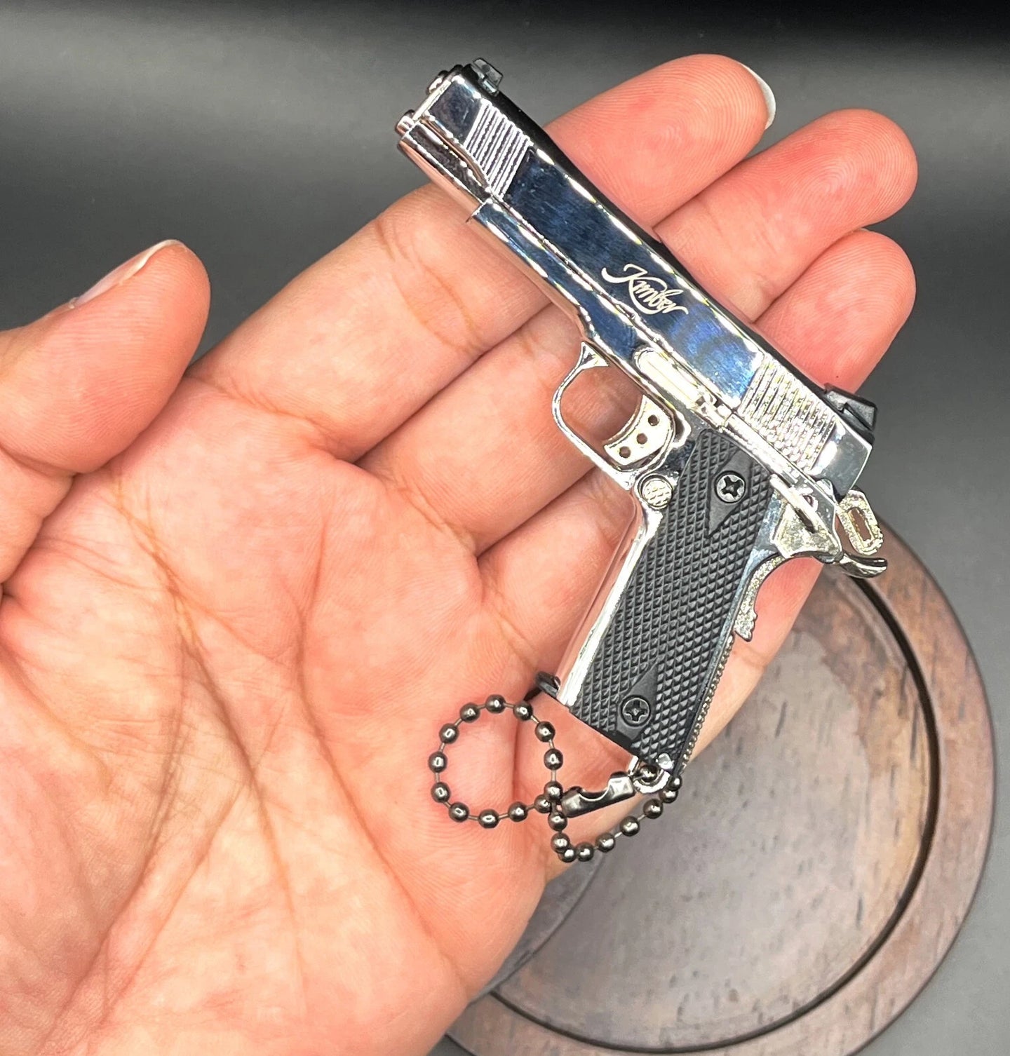 1:3 1911 Scale Handgun - Shiny Silver miniature die cast metal model with working thumb safety and slide.