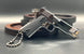 1:3 1911 Scale Handgun - Shiny Silver miniature die cast metal model with black grips and working parts on display.