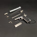 1:3 1911 Scale Handgun - Silver miniature die cast metal model with disassembled parts on black background.