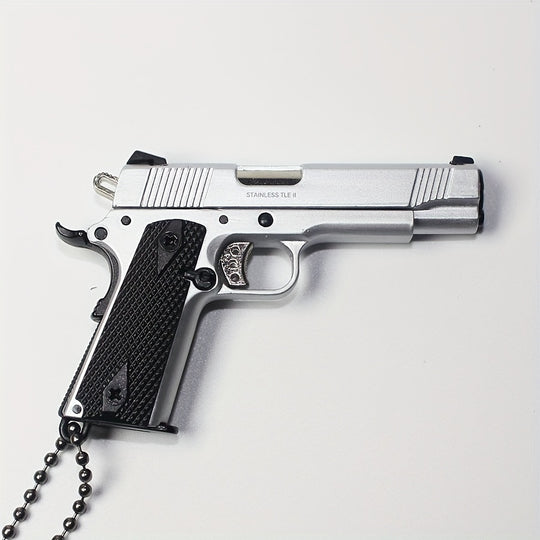 1:3 1911 Scale Handgun - Silver miniature metal model with working thumb safety and slide action on white background